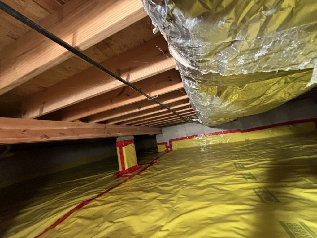 Encapsulated crawl space in a St. Louis, MO home with a clean and sealed environment.