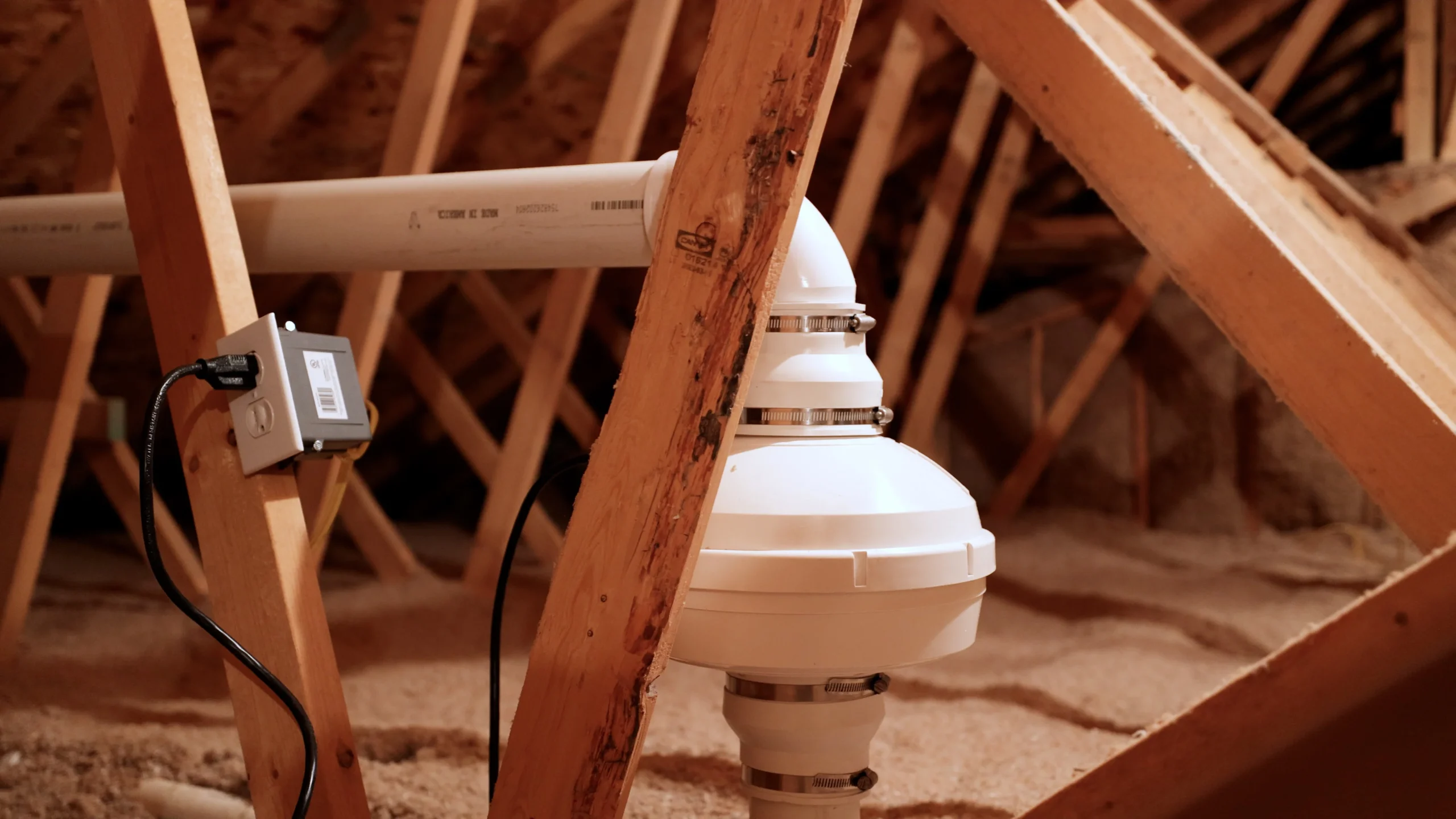 Radon mitigation fan install in a St. Louis Attic
