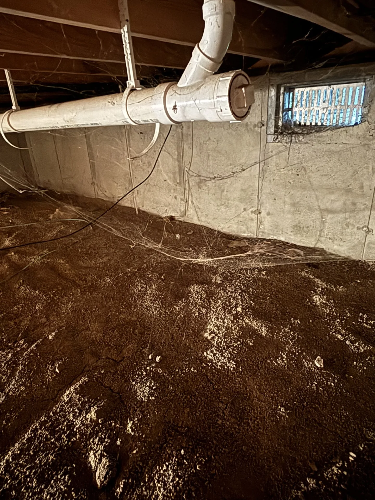 Crawl space encapsulation work sealing a St. Louis area crawl space